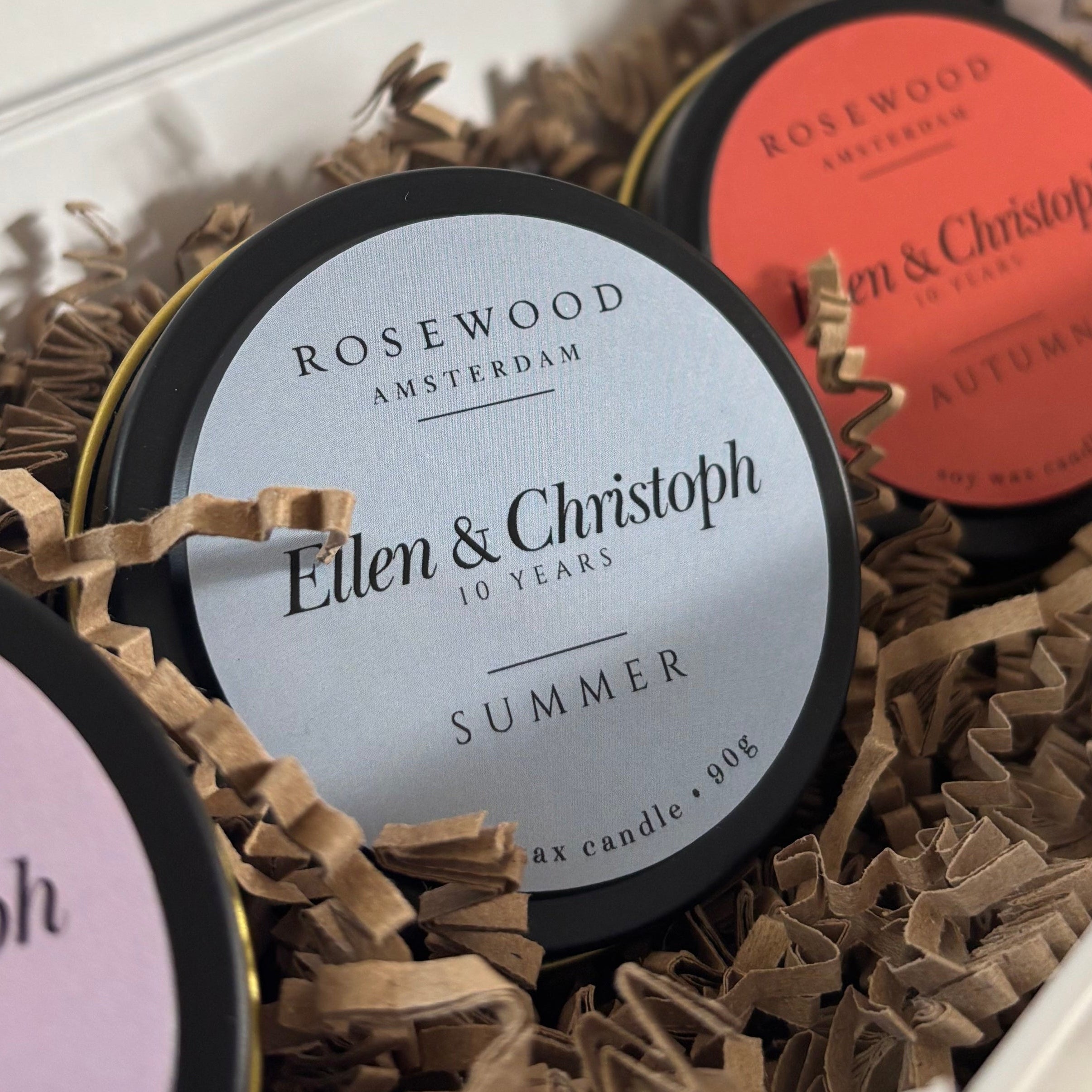 Personalised candle tins with labels in a decorative box